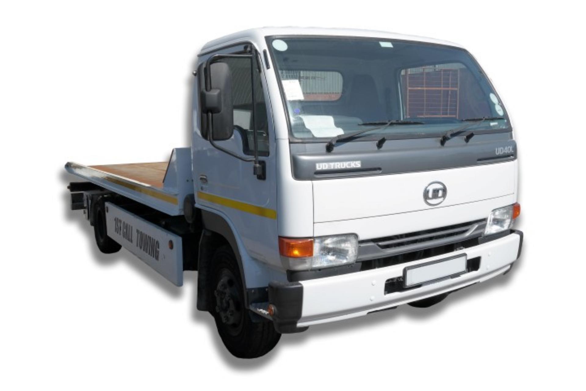 Nissan Trucks UD 40 4.0 L Rollback Tow Truck