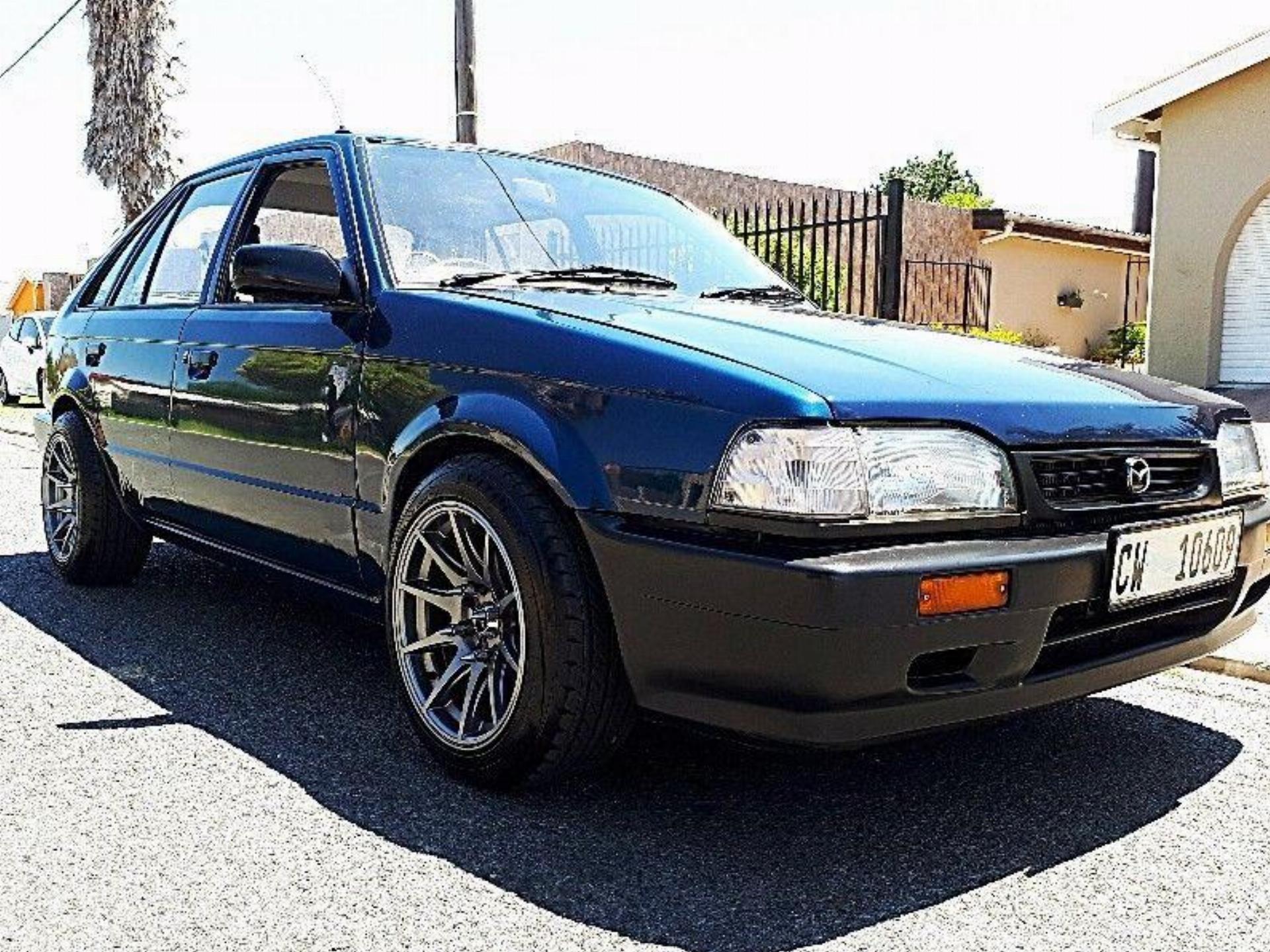 Used Mazda 323 130 Sting 2001 on auction PV1028875